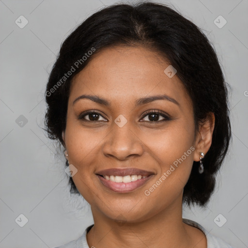 Joyful latino young-adult female with medium  brown hair and brown eyes
