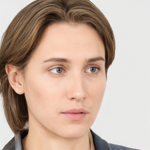 Neutral white young-adult female with medium  brown hair and grey eyes