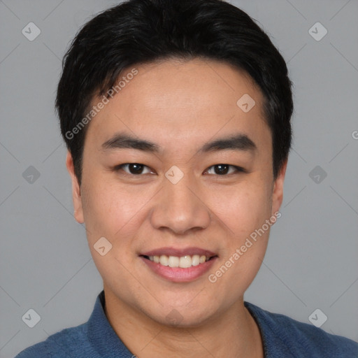 Joyful white young-adult male with short  black hair and brown eyes