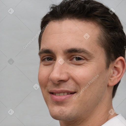 Joyful white young-adult male with short  brown hair and brown eyes