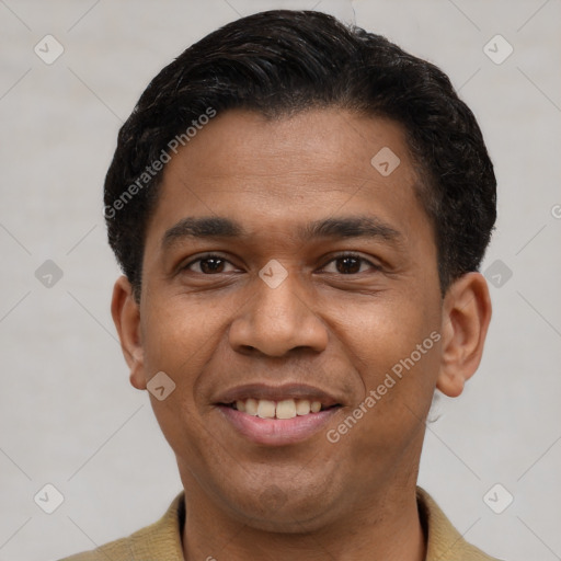 Joyful latino young-adult male with short  black hair and brown eyes