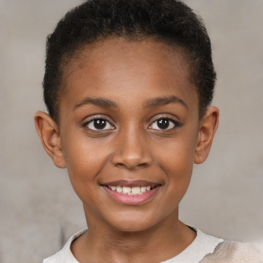 Joyful black child female with short  brown hair and brown eyes