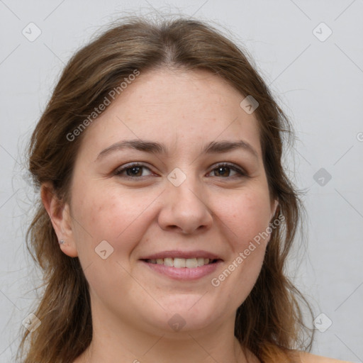 Joyful white adult female with medium  brown hair and brown eyes