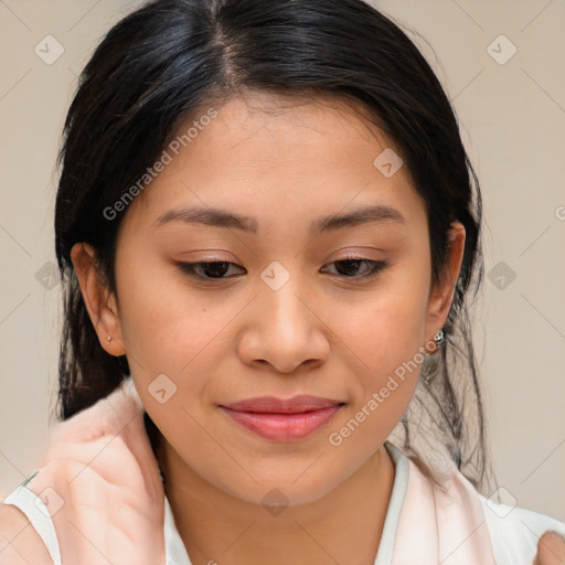 Joyful latino young-adult female with medium  brown hair and brown eyes