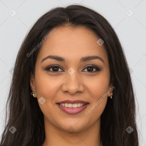 Joyful latino young-adult female with long  brown hair and brown eyes