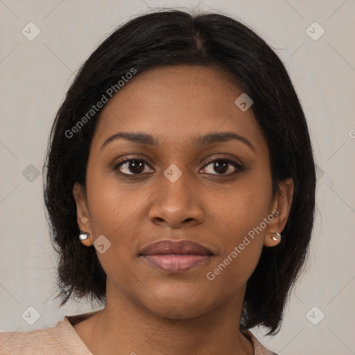 Joyful black young-adult female with medium  brown hair and brown eyes