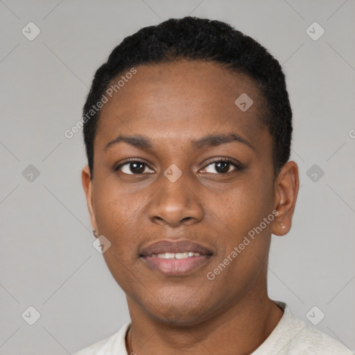 Joyful black young-adult female with short  black hair and brown eyes