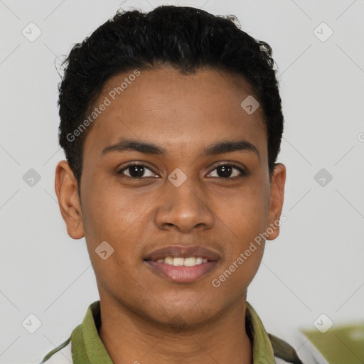 Joyful black young-adult male with short  brown hair and brown eyes