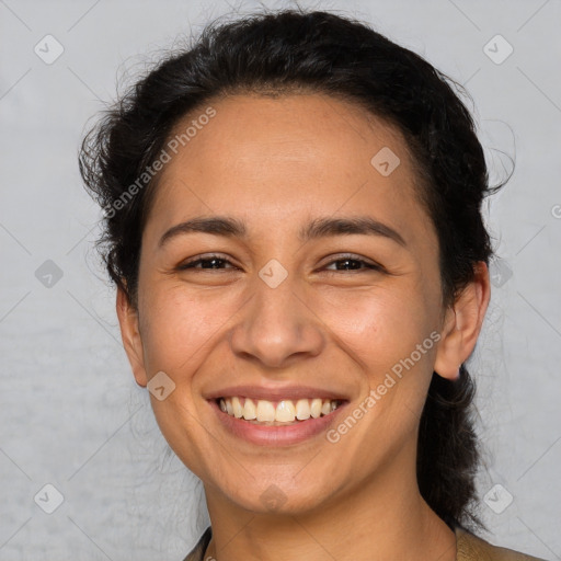 Joyful white adult female with medium  brown hair and brown eyes