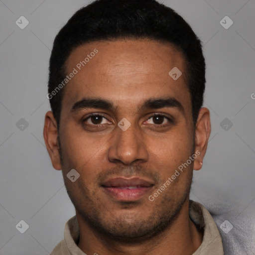 Joyful white young-adult male with short  black hair and brown eyes