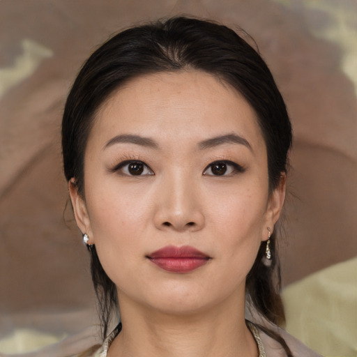 Neutral asian young-adult female with medium  black hair and brown eyes