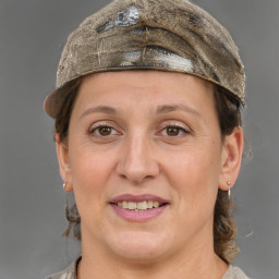 Joyful white adult female with short  brown hair and grey eyes