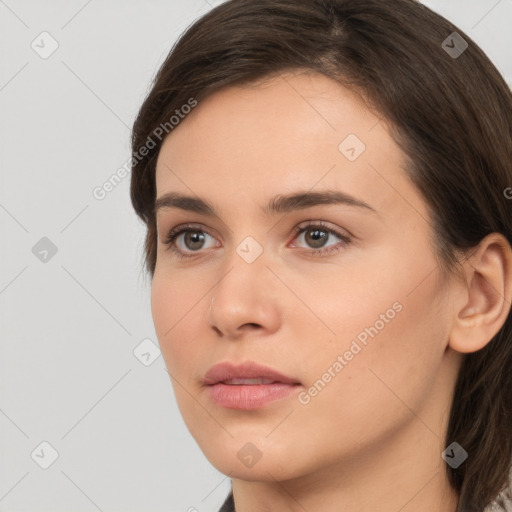 Neutral white young-adult female with medium  brown hair and brown eyes