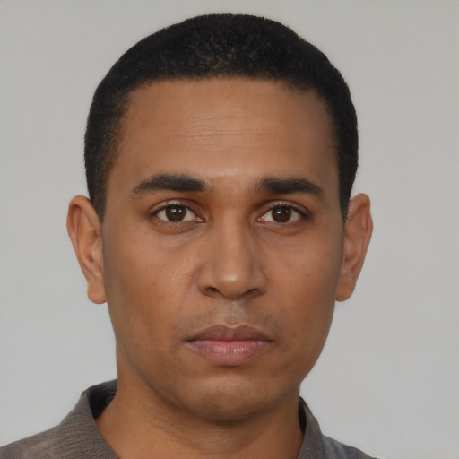 Neutral black young-adult male with short  black hair and brown eyes