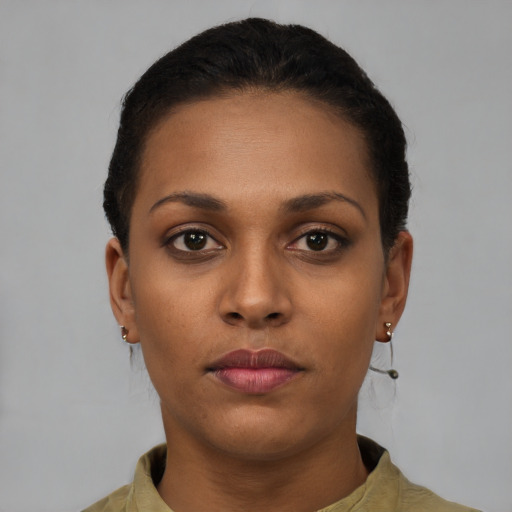 Neutral black young-adult female with short  brown hair and brown eyes