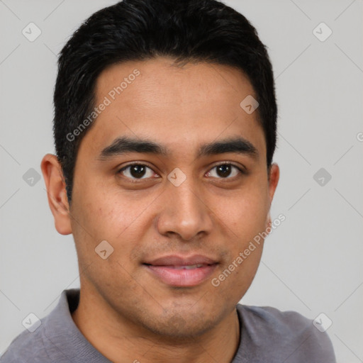 Joyful latino young-adult male with short  brown hair and brown eyes