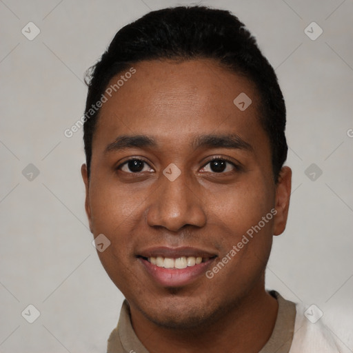 Joyful black young-adult male with short  black hair and brown eyes