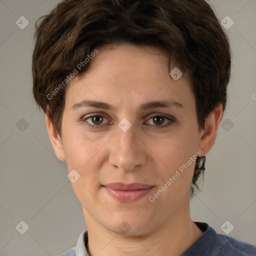 Joyful white adult female with short  brown hair and brown eyes