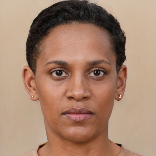 Neutral latino young-adult female with short  brown hair and brown eyes