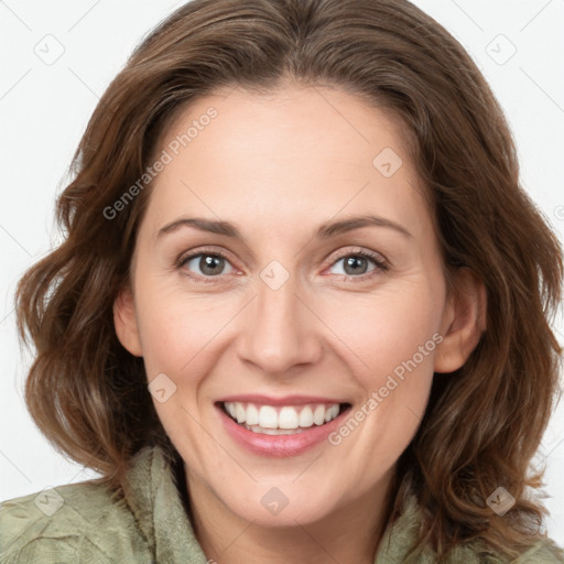 Joyful white young-adult female with medium  brown hair and green eyes