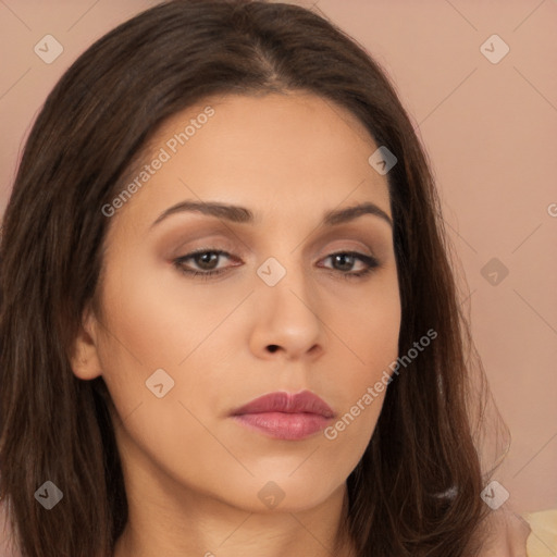 Neutral white young-adult female with long  brown hair and brown eyes