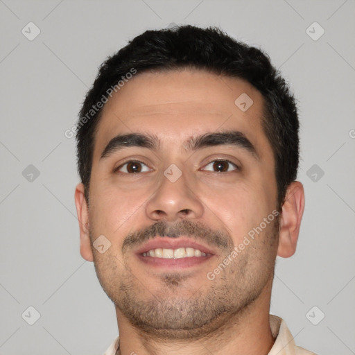 Joyful white young-adult male with short  black hair and brown eyes