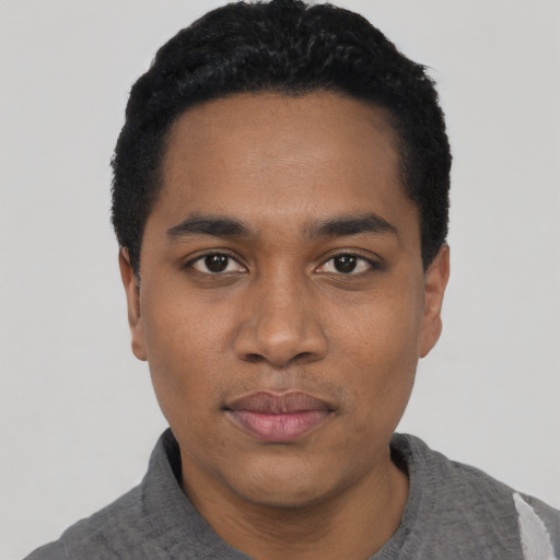 Neutral black young-adult male with short  black hair and brown eyes