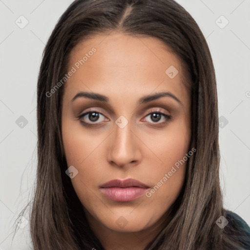 Neutral white young-adult female with long  brown hair and brown eyes