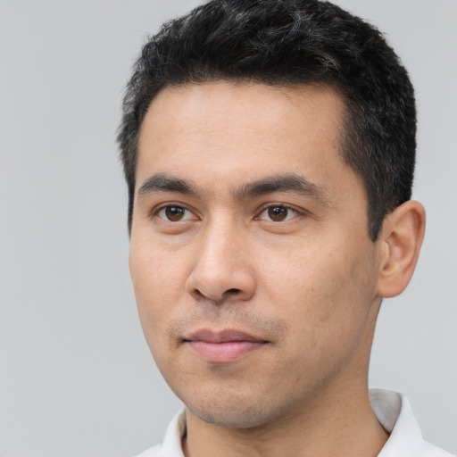 Neutral asian young-adult male with short  black hair and brown eyes