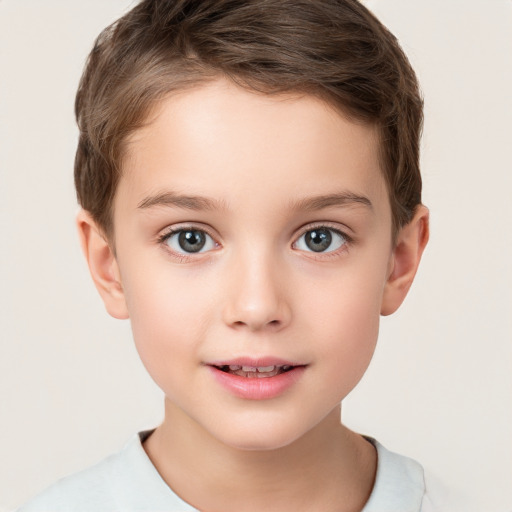 Joyful white child male with short  brown hair and brown eyes