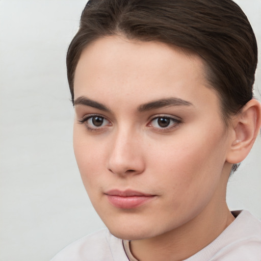 Neutral white young-adult female with short  brown hair and brown eyes