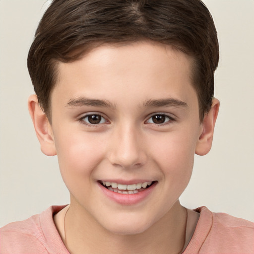 Joyful white child male with short  brown hair and brown eyes