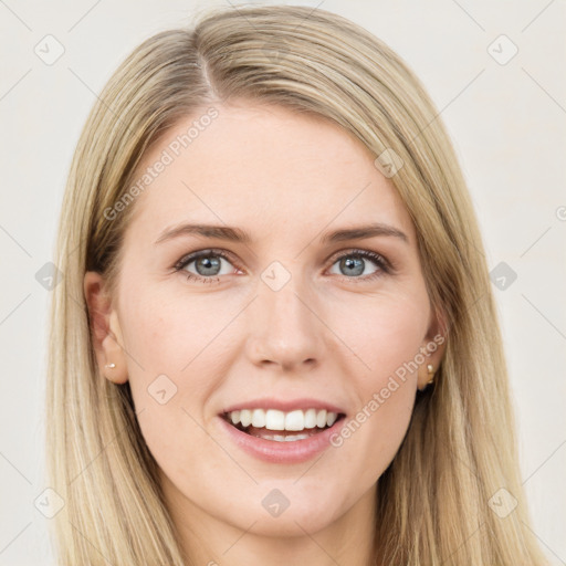 Joyful white young-adult female with long  brown hair and green eyes