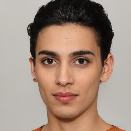 Neutral latino young-adult male with short  black hair and brown eyes