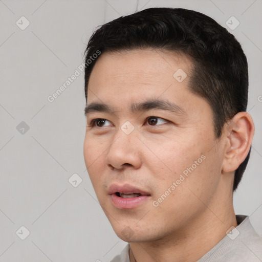 Neutral asian young-adult male with short  black hair and brown eyes