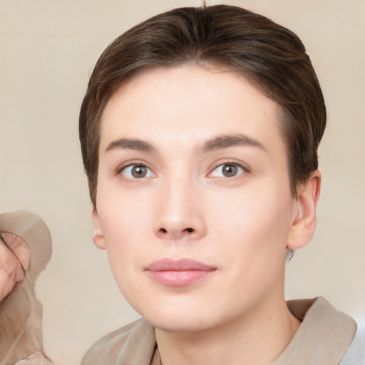 Neutral white young-adult female with short  brown hair and brown eyes