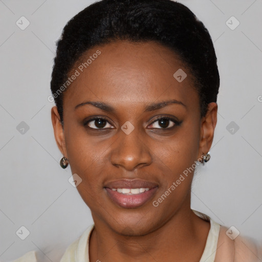 Joyful black young-adult female with short  brown hair and brown eyes