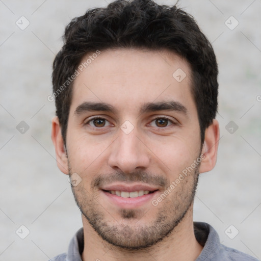 Joyful white young-adult male with short  black hair and brown eyes