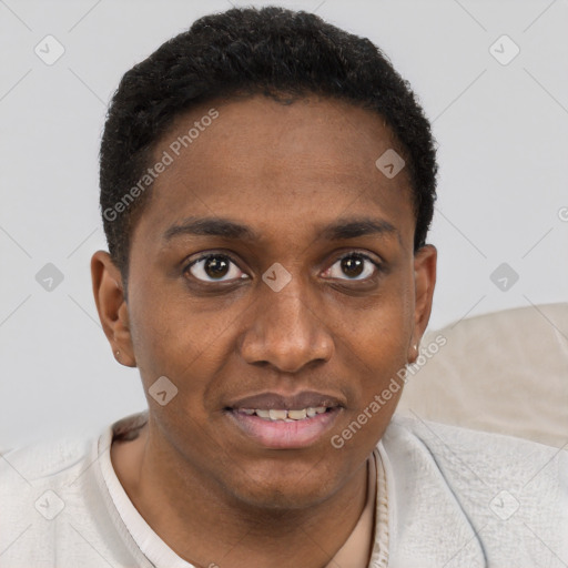 Joyful black young-adult male with short  brown hair and brown eyes