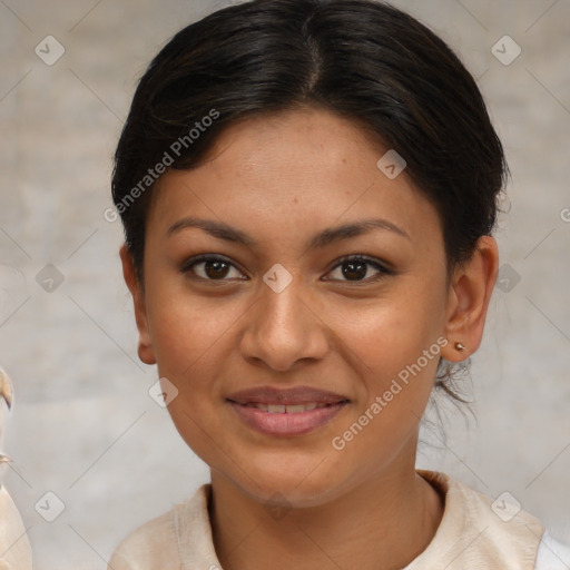 Joyful latino young-adult female with medium  brown hair and brown eyes