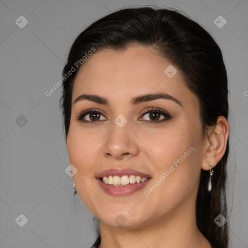 Joyful white young-adult female with long  brown hair and brown eyes