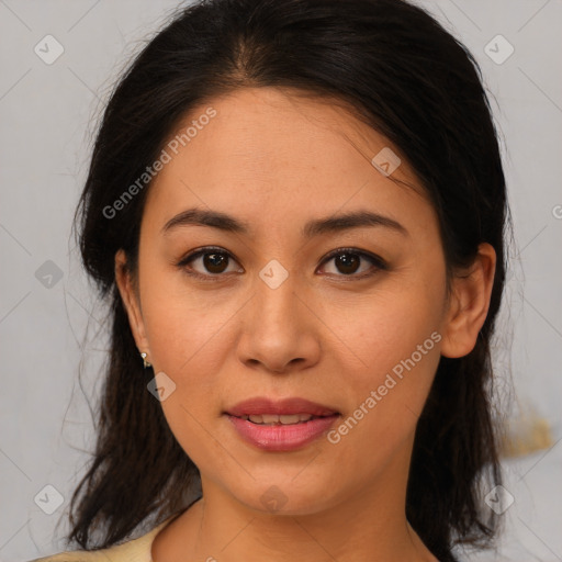 Joyful latino young-adult female with medium  brown hair and brown eyes