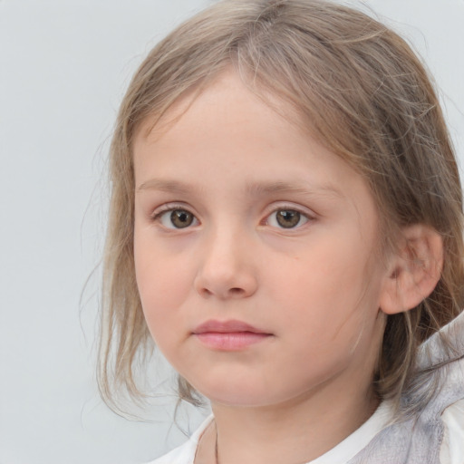 Neutral white child female with medium  brown hair and grey eyes