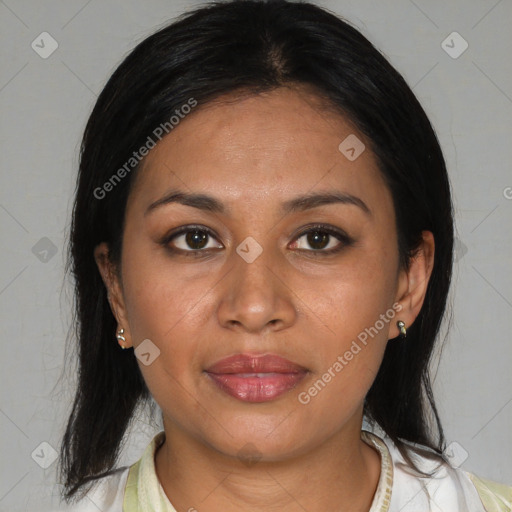 Joyful latino young-adult female with medium  brown hair and brown eyes