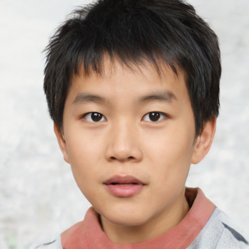 Neutral asian child male with short  brown hair and brown eyes