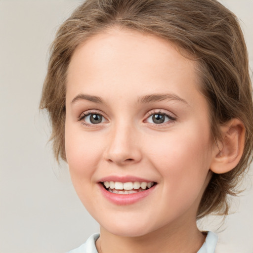 Joyful white young-adult female with medium  brown hair and green eyes