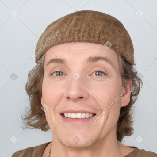 Joyful white adult female with short  brown hair and grey eyes