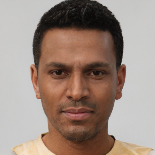Neutral white young-adult male with short  black hair and brown eyes