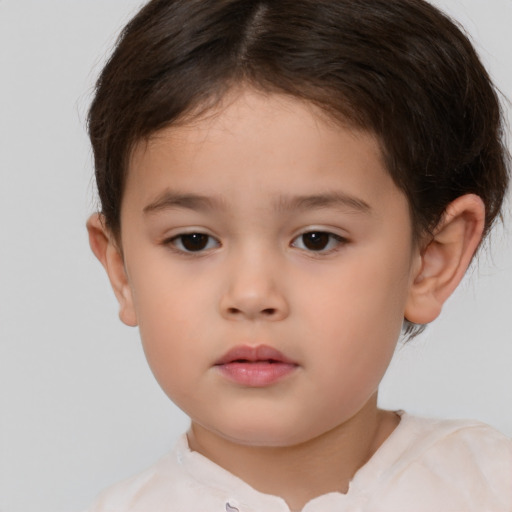 Neutral white child female with short  brown hair and brown eyes