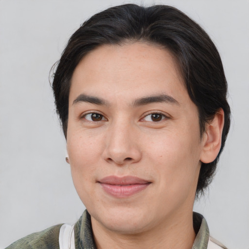 Joyful white young-adult male with medium  brown hair and brown eyes